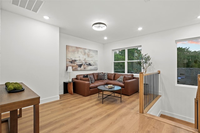 426 Avenue Ave E, Dallas, TX 75203 - living area with light wood finished floors, recessed lighting, and baseboards