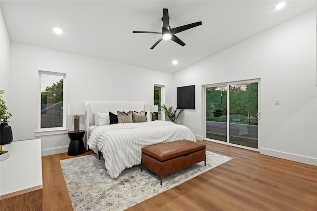 426 Avenue Ave E, Dallas, TX 75203 - bedroom with access to exterior, wood finished floors, recessed lighting, lofted ceiling, and baseboards