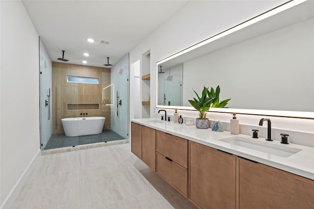 426 Avenue Ave E, Dallas, TX 75203 - full bath featuring a shower stall, recessed lighting, double vanity, baseboards, and a freestanding tub