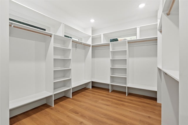 426 Avenue Ave E, Dallas, TX 75203 - walk in closet featuring light wood finished floors