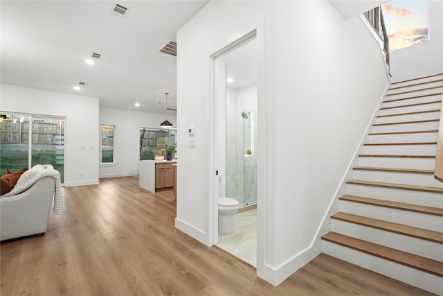 426 Avenue Ave E, Dallas, TX 75203 - stairway featuring wood finished floors, recessed lighting, and baseboards