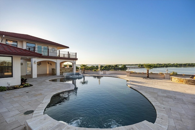 4029 Whiterock Trl, Garland, TX 75043 - view of pool with a patio area, a pool with connected hot tub, and a water view