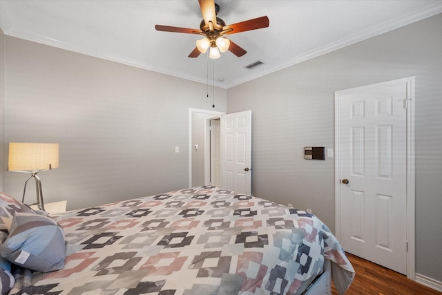 2101 Saint Michaels Dr Unit 109, Arlington, TX 76011 - bedroom featuring wood finished floors, crown molding, and a ceiling fan