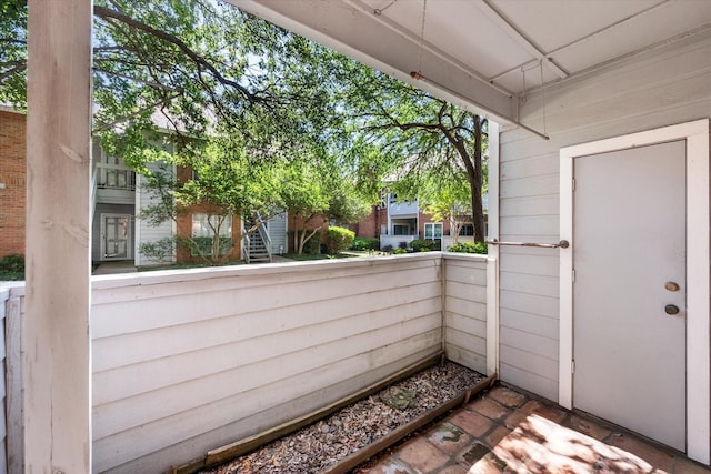 2101 Saint Michaels Dr Unit 109, Arlington, TX 76011 - view of patio / terrace featuring a balcony