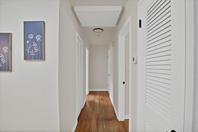 610 Phillips St, Cleburne, TX 76033 - hall featuring wood finished floors and baseboards