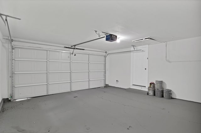 610 Phillips St, Cleburne, TX 76033 - garage featuring a garage door opener