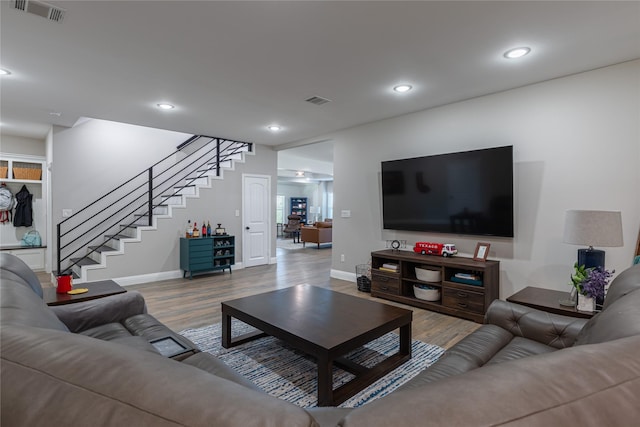 117 Rock Salt Dr, Springtown, TX 76082 - living room featuring stairway, wood finished floors, baseboards, and recessed lighting