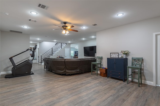 117 Rock Salt Dr, Springtown, TX 76082 - living room with wood finished floors, stairway, baseboards, and recessed lighting