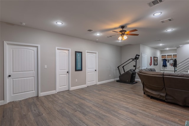 117 Rock Salt Dr, Springtown, TX 76082 - living area featuring wood finished floors, baseboards, a ceiling fan, stairs, and recessed lighting