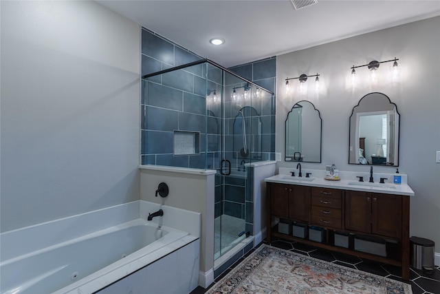 117 Rock Salt Dr, Springtown, TX 76082 - bathroom featuring double vanity, a stall shower, a garden tub, tile patterned flooring, and recessed lighting