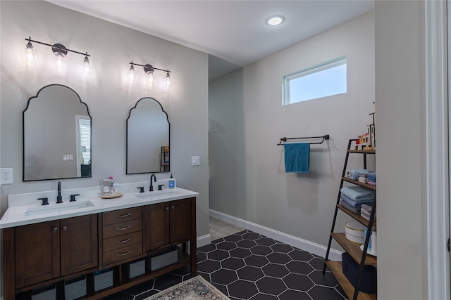 117 Rock Salt Dr, Springtown, TX 76082 - full bathroom featuring double vanity, baseboards, recessed lighting, and tile patterned flooring