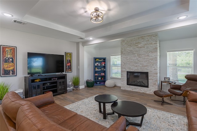 117 Rock Salt Dr, Springtown, TX 76082 - living room featuring wood finished floors, a fireplace, baseboards, and recessed lighting