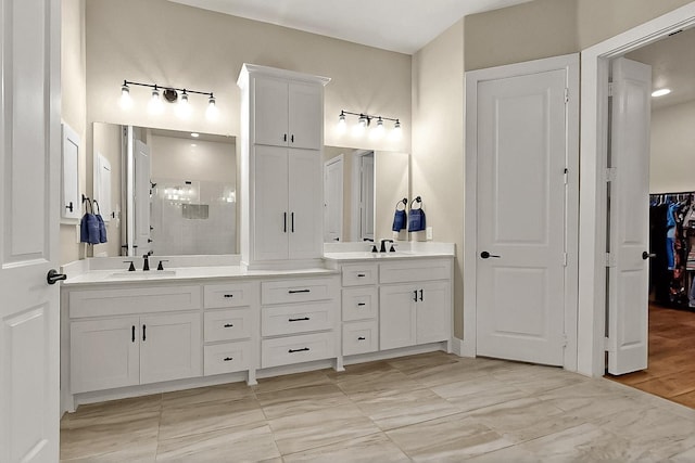 308 Secretariat, Hickory Creek, TX 75065 - bathroom with a shower stall, double vanity, and a closet