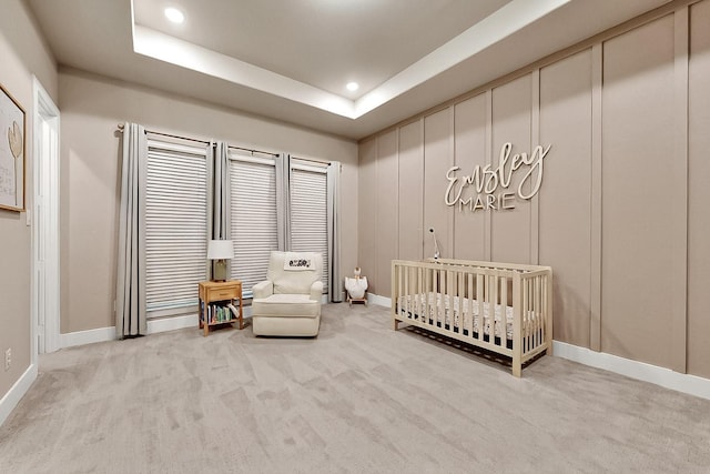 308 Secretariat, Hickory Creek, TX 75065 - carpeted bedroom featuring baseboards, recessed lighting, a nursery area, and a raised ceiling