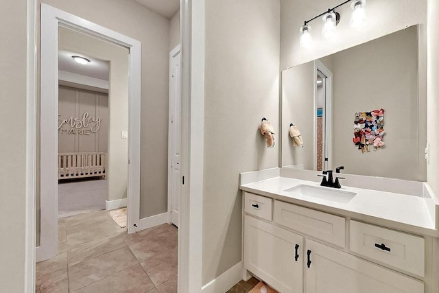 308 Secretariat, Hickory Creek, TX 75065 - bathroom featuring vanity, baseboards, and tile patterned floors