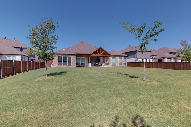 308 Secretariat, Hickory Creek, TX 75065 - rear view of house with brick siding