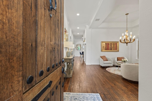 3063 Mitchell Way, The Colony, TX 75056 - foyer entrance with dark wood-style floors, a chandelier, baseboards, a raised ceiling, and recessed lighting
