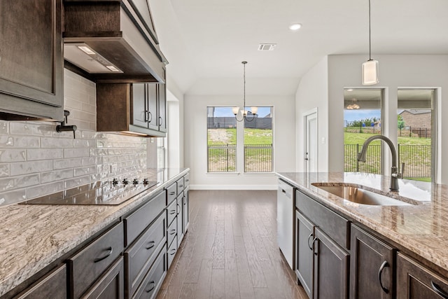 737 Winecup Way, Midlothian, TX 76065 - kitchen featuring a sink, wall chimney range hood, dishwashing machine, dark brown cabinets, and backsplash