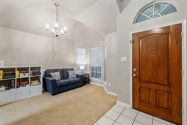 3601 Carmel Mountain Dr, Mckinney, TX 75070 - entryway featuring a chandelier, light carpet, light tile patterned floors, baseboards, and high vaulted ceiling
