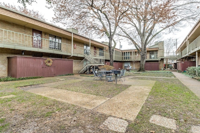 5916 Birchbrook Dr Unit 129, Dallas, TX 75206 - view of yard featuring stairway