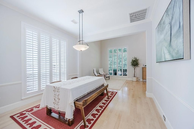 513 Suncreek Dr, Allen, TX 75013 - bedroom with light wood-type flooring, crown molding, and baseboards