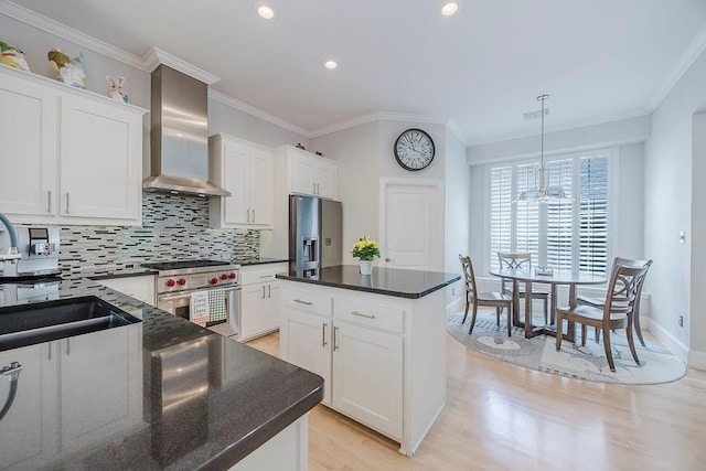 513 Suncreek Dr, Allen, TX 75013 - kitchen with wall chimney range hood, stainless steel appliances, a sink, ornamental molding, and tasteful backsplash