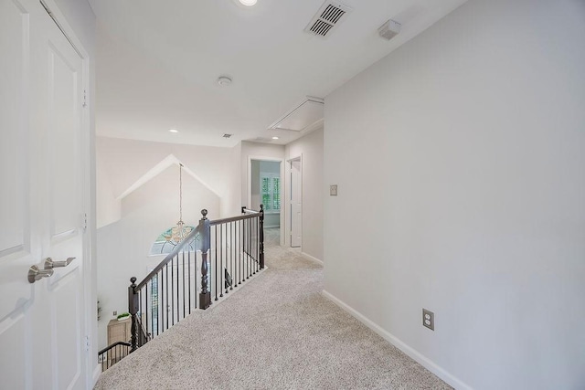 513 Suncreek Dr, Allen, TX 75013 - hall featuring attic access, carpet, baseboards, and recessed lighting