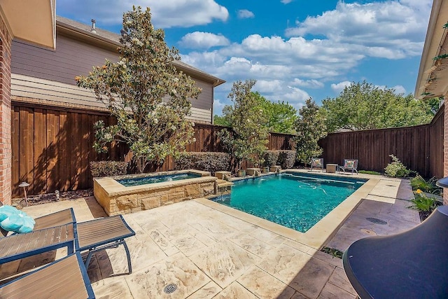 513 Suncreek Dr, Allen, TX 75013 - view of swimming pool featuring a patio, a fenced backyard, and a pool with connected hot tub