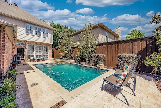 513 Suncreek Dr, Allen, TX 75013 - view of swimming pool with a patio, a fenced backyard, and a pool with connected hot tub
