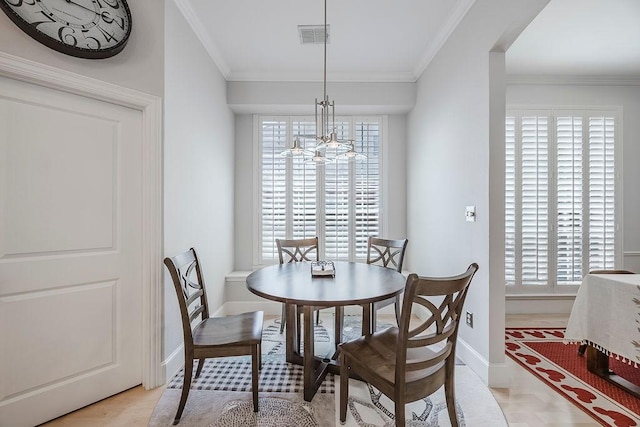 513 Suncreek Dr, Allen, TX 75013 - dining space featuring a chandelier, ornamental molding, plenty of natural light, and baseboards
