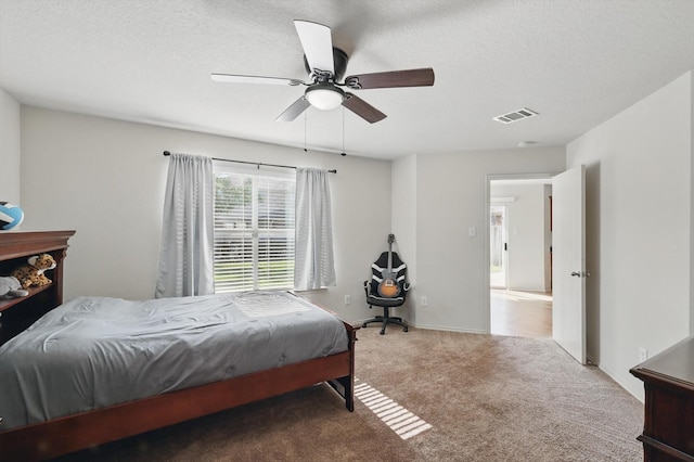 10748 Irish Glen Trl, Fort Worth, TX 76052 - carpeted bedroom featuring ceiling fan and a textured ceiling