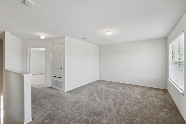 10748 Irish Glen Trl, Fort Worth, TX 76052 - unfurnished room featuring carpet, a smoke detector, and baseboards