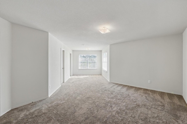 10748 Irish Glen Trl, Fort Worth, TX 76052 - carpeted empty room with baseboards