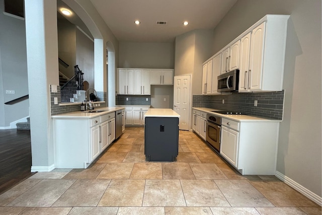 344 Huffman Blf, Keller, TX 76248 - kitchen with stainless steel appliances, a sink, baseboards, backsplash, and recessed lighting