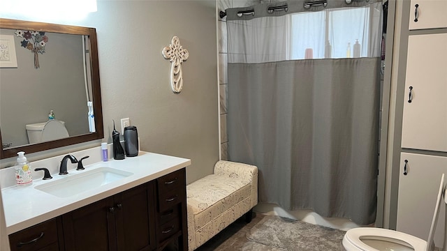501 Linda Kay Dr, Winnsboro, TX 75494 - bathroom with toilet, vanity, and shower / bath combo with shower curtain