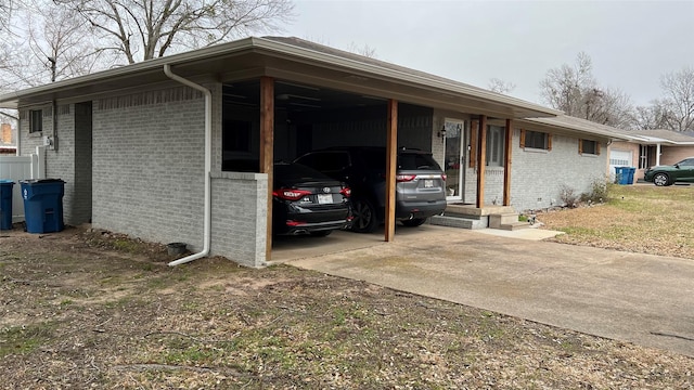 501 Linda Kay Dr, Winnsboro, TX 75494 - view of vehicle parking with driveway and a carport
