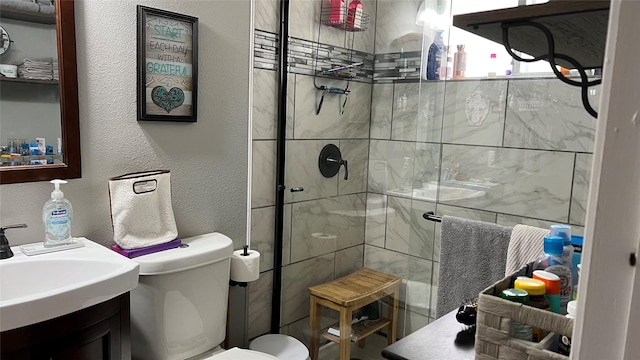 501 Linda Kay Dr, Winnsboro, TX 75494 - full bath with a stall shower, toilet, vanity, and a textured wall