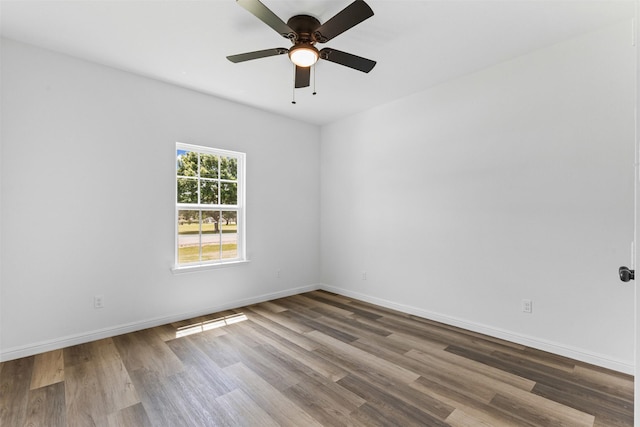 1612 Cheyenne Trl, Granbury, TX 76048 - spare room featuring wood finished floors, ceiling fan, and baseboards