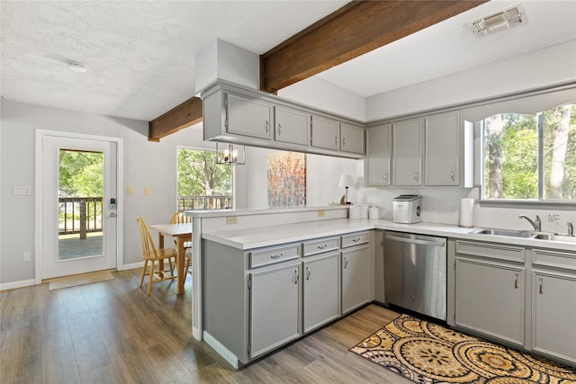 107 Nob Hill Cir, Malakoff, TX 75148 - kitchen featuring gray cabinets, dishwasher, a sink, a peninsula, and wood finished floors