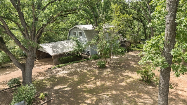 107 Nob Hill Cir, Malakoff, TX 75148 - view of yard with a wooden deck and a wooded view
