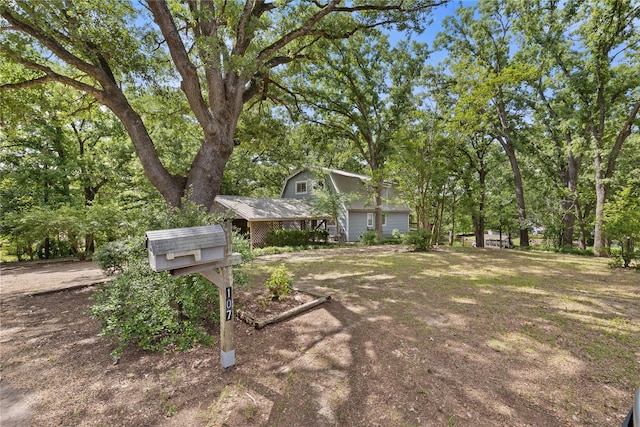 107 Nob Hill Cir, Malakoff, TX 75148 - view of yard featuring a garage