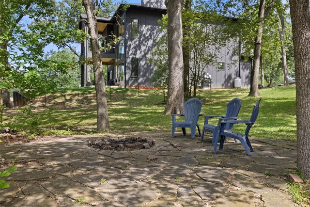 107 Nob Hill Cir, Malakoff, TX 75148 - view of grassy yard with a patio and a fire pit