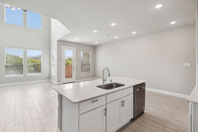 2929 Galveston St, Plano, TX 75075 - kitchen featuring a sink, dishwasher, baseboards, open floor plan, and light countertops