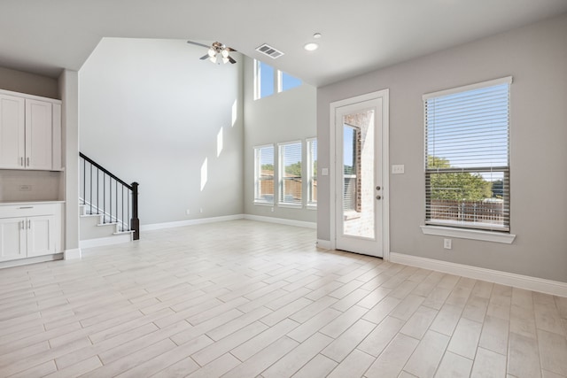 2929 Galveston St, Plano, TX 75075 - unfurnished living room featuring stairs, a ceiling fan, baseboards, light wood finished floors, and recessed lighting