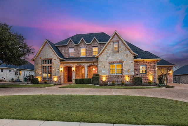 3316 Fairway Dr, Denton, TX 76226 - french provincial home featuring a front lawn, a standing seam roof, roof with shingles, and stone siding
