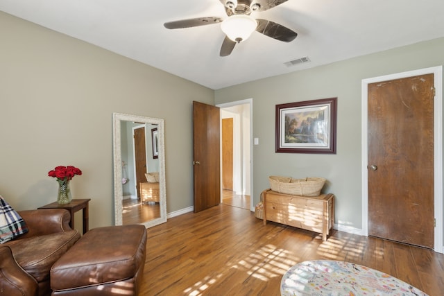 325 Apache Trl, Keller, TX 76248 - living area with wood finished floors, ceiling fan, and baseboards