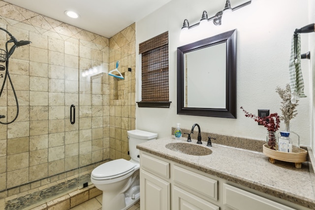 325 Apache Trl, Keller, TX 76248 - full bathroom featuring a shower stall, toilet, vanity, and tile patterned floors