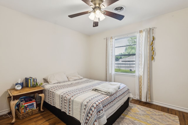 325 Apache Trl, Keller, TX 76248 - bedroom with baseboards, wood finished floors, and ceiling fan