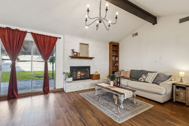 325 Apache Trl, Keller, TX 76248 - living area featuring a chandelier, wood finished floors, and a fireplace