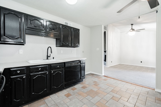 9406 Shipman St, Rowlett, TX 75088 - kitchen with dishwasher, a sink, dark cabinets, ceiling fan, and crown molding